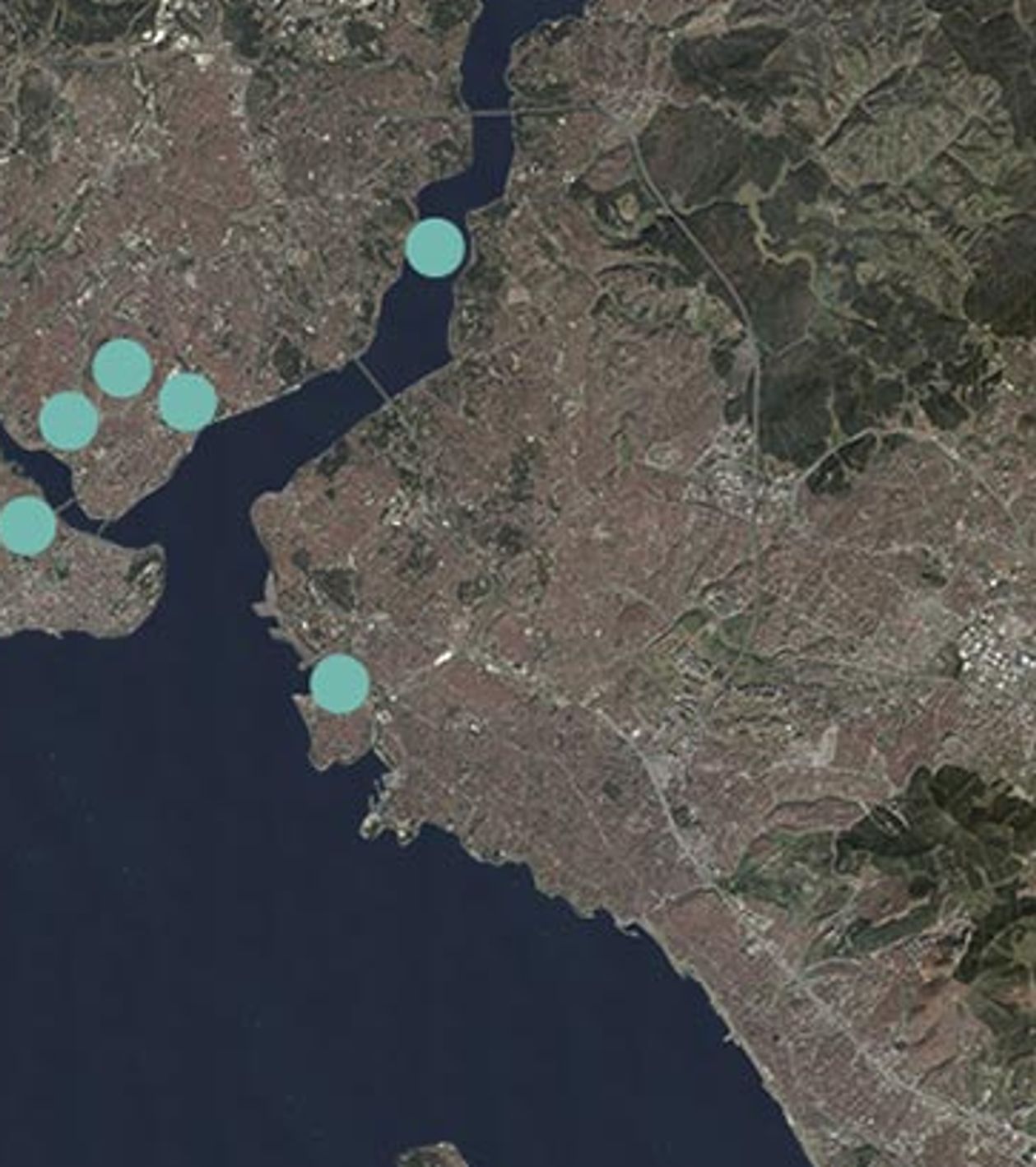 A satellite image of the Bosphorus with mint green dots at various locations. On the offshore islands, around Istanbul, along the canal and on both sides of the end of the canal.