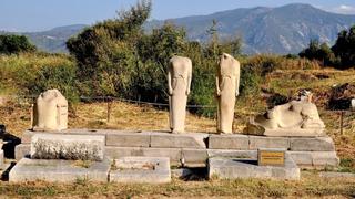 Family monument, so-called Geneleos style ca. 560 BC, in the background dry bushes and the islands mountains