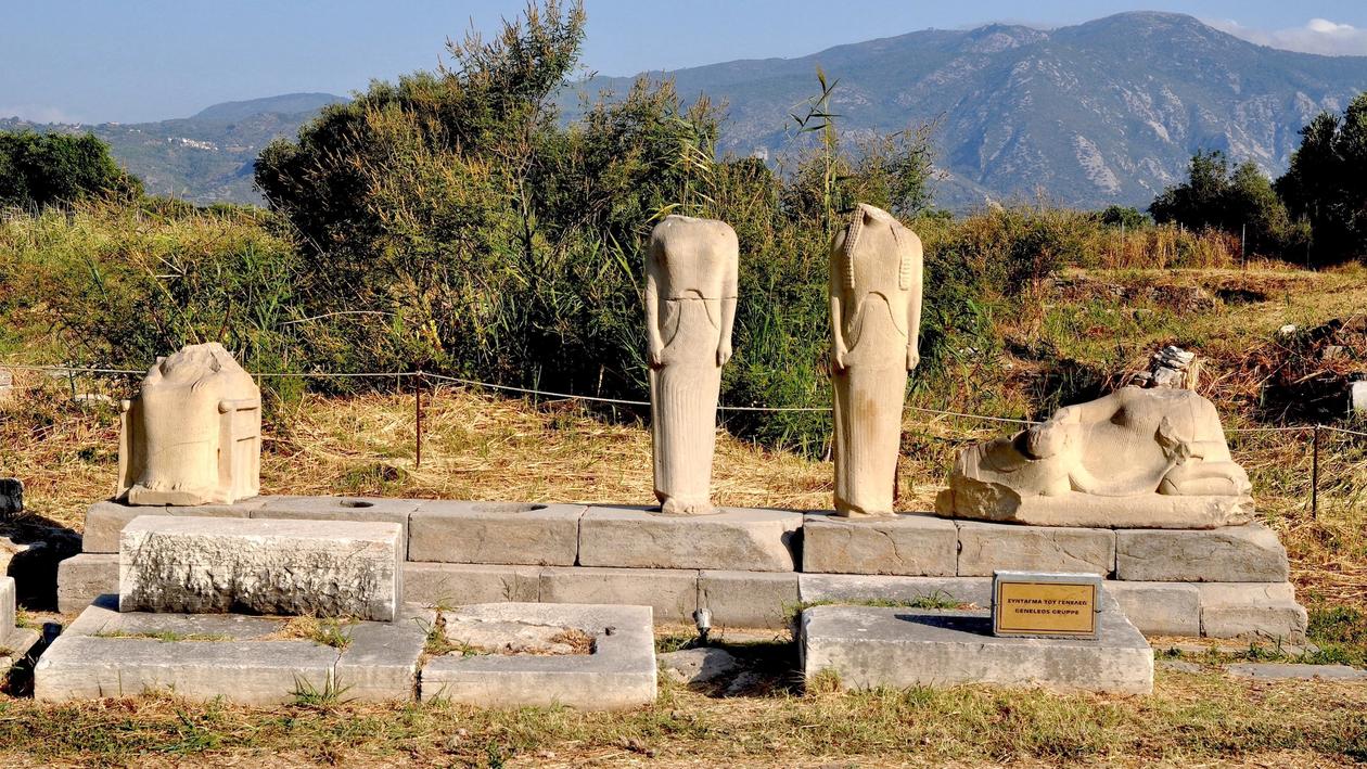 Family monument, so-called Geneleos style ca. 560 BC, in the background dry bushes and the islands mountains