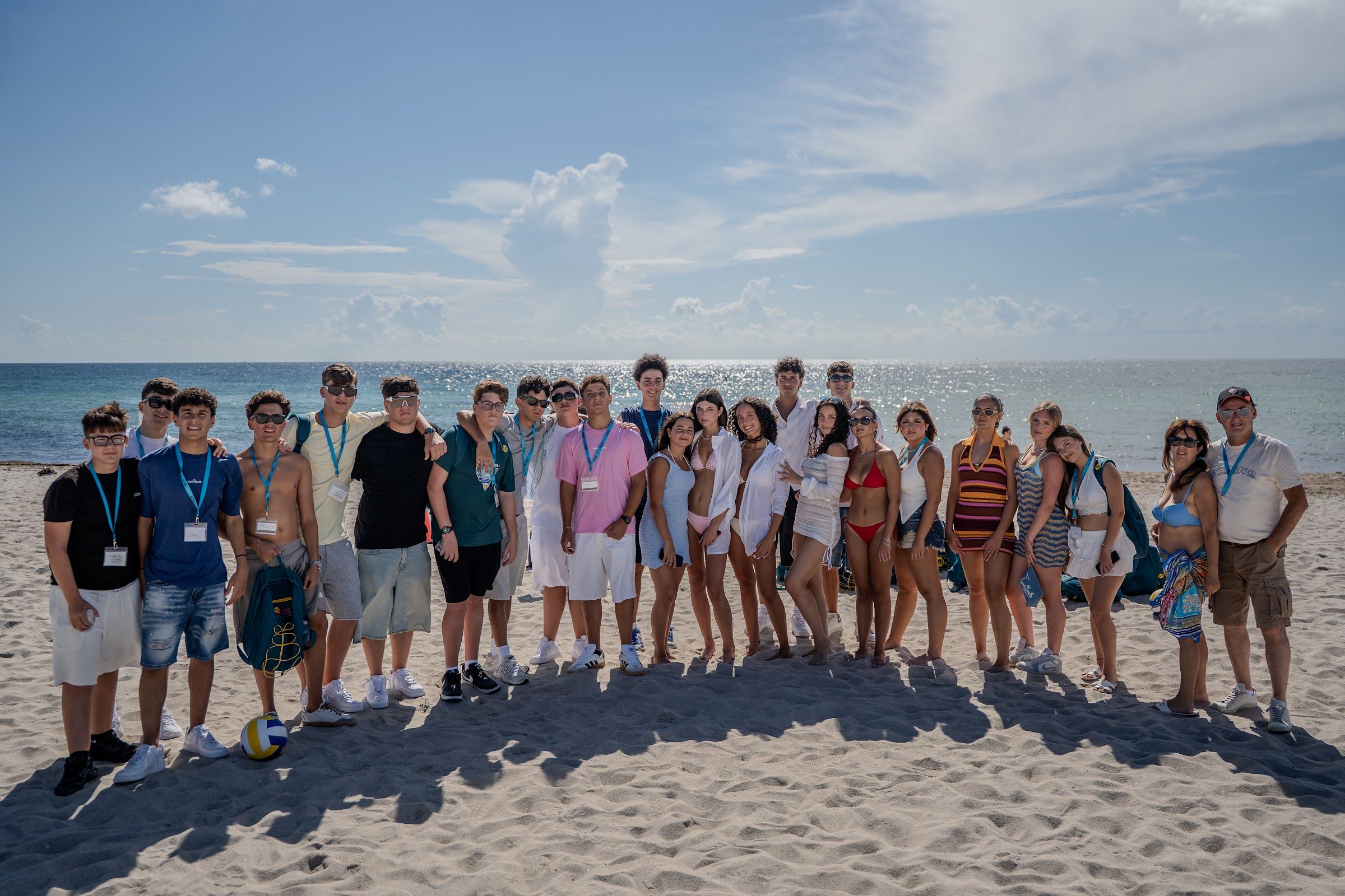 A YES USA group on the beach in Miami on a sunny day