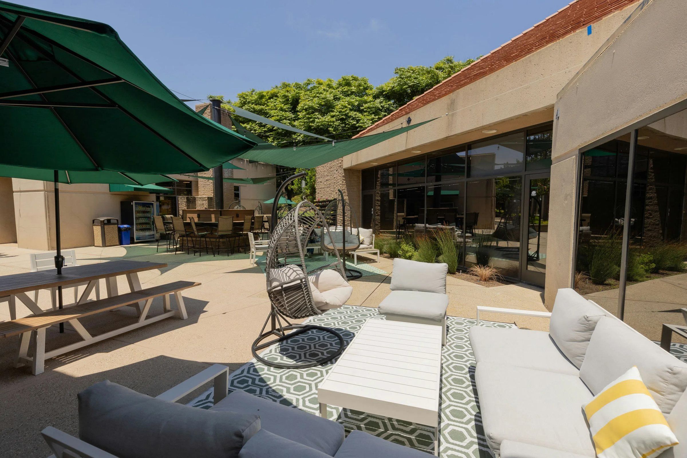 Shaded patio with outdoor seating at Concordia University Irvine