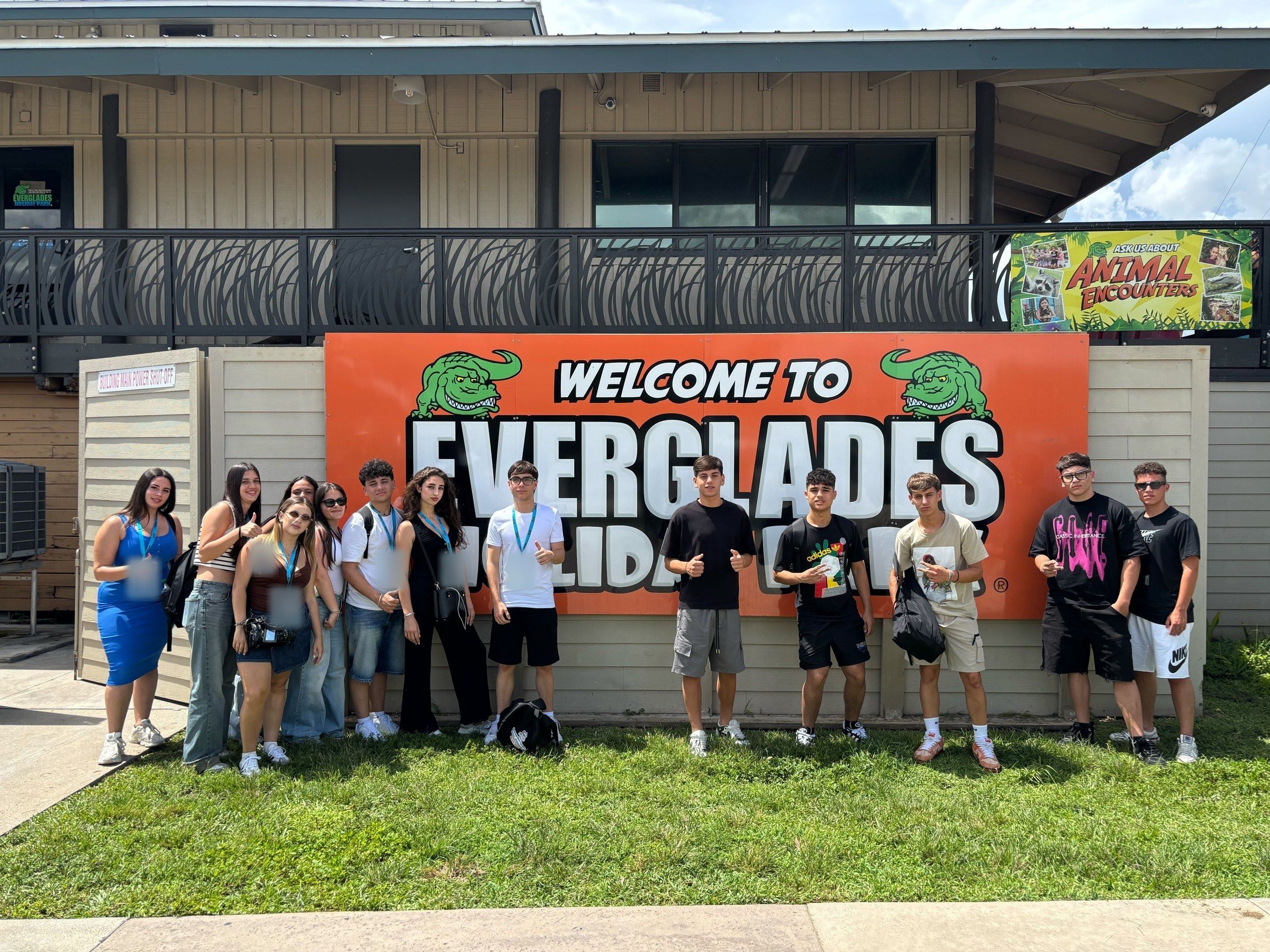 A YES USA group at the Welcome to Everglades sign
