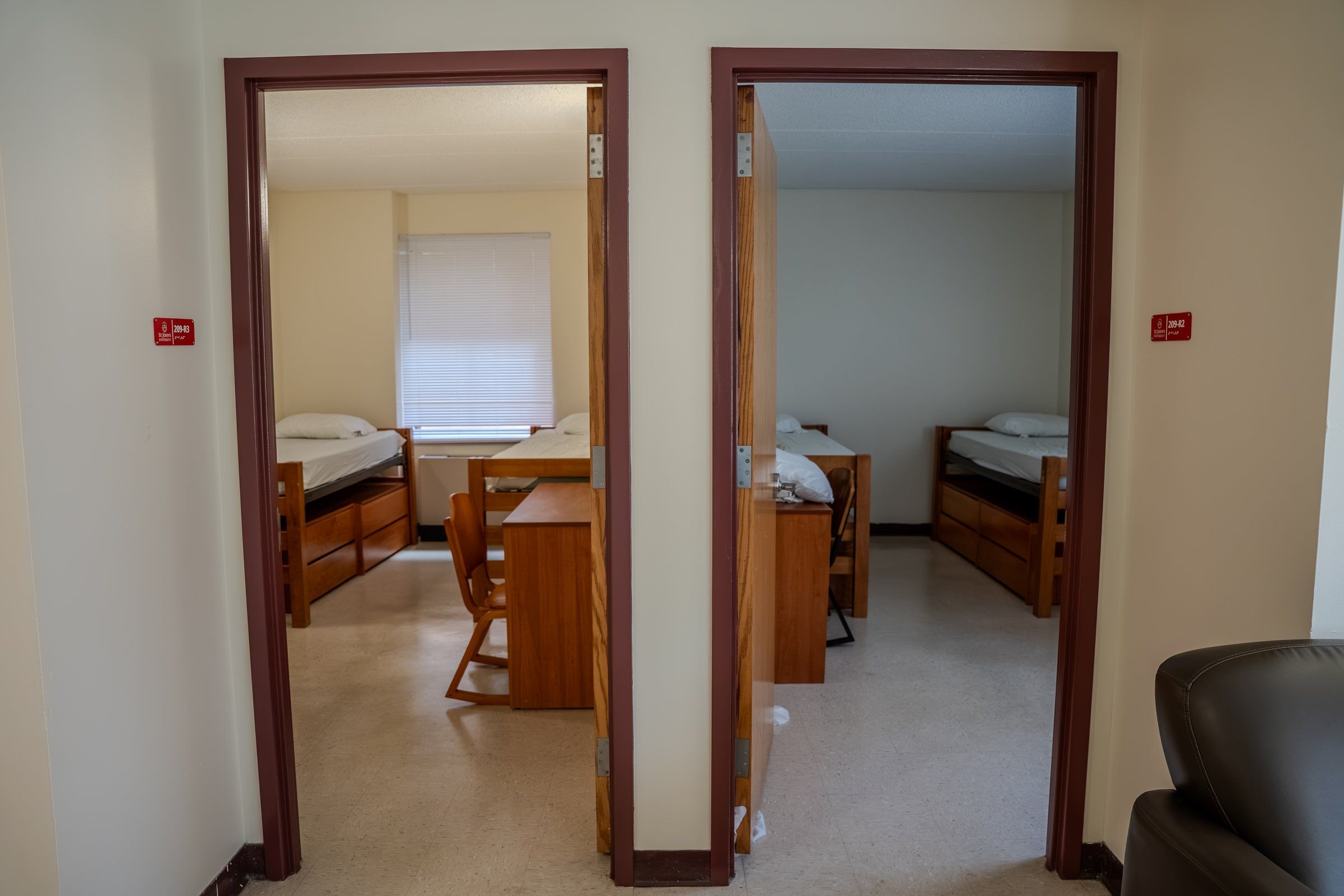 Two bedroom doors opening off a shared suite in a St. John's residence