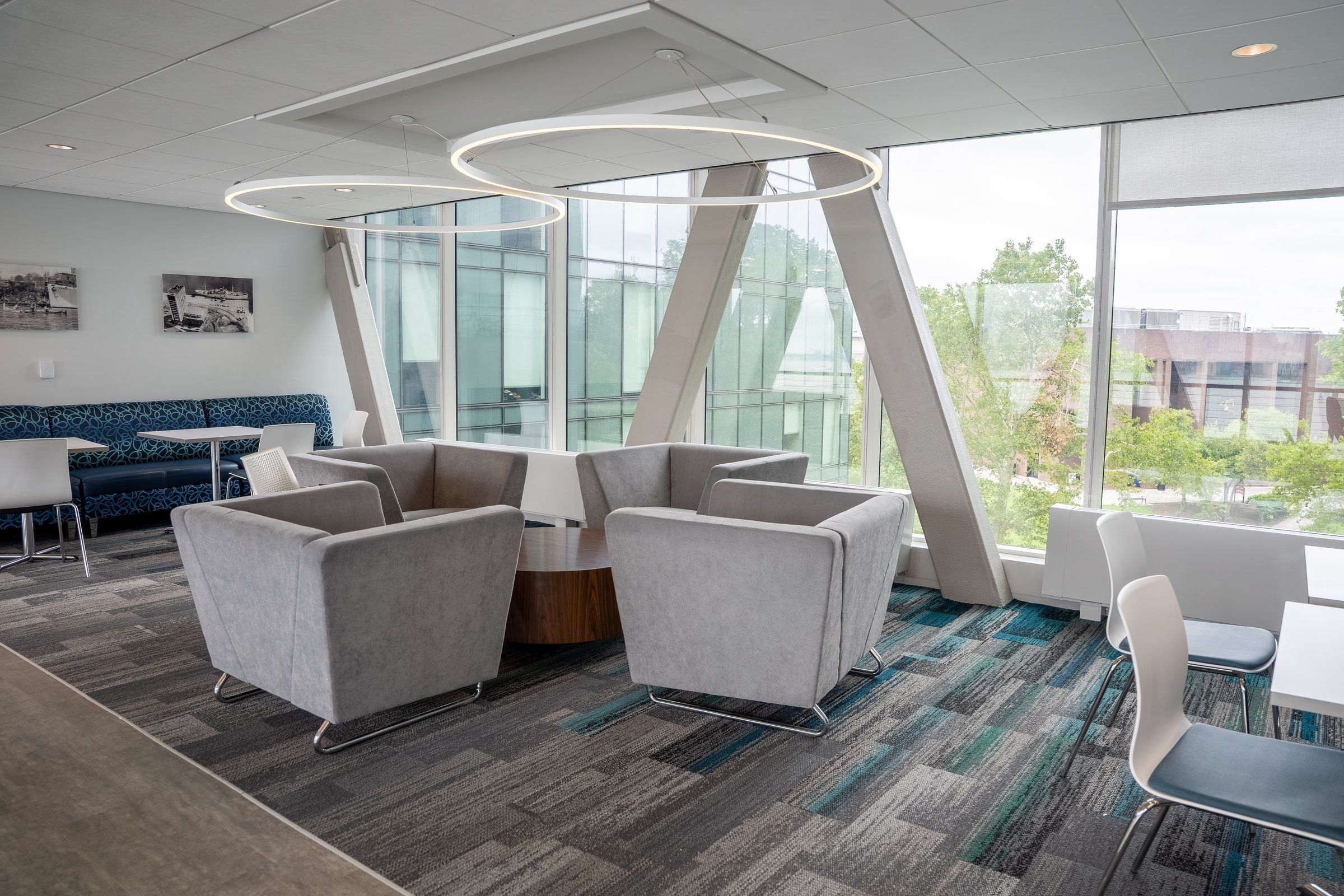 Bright student lounge with armchairs and big windows at Stevens