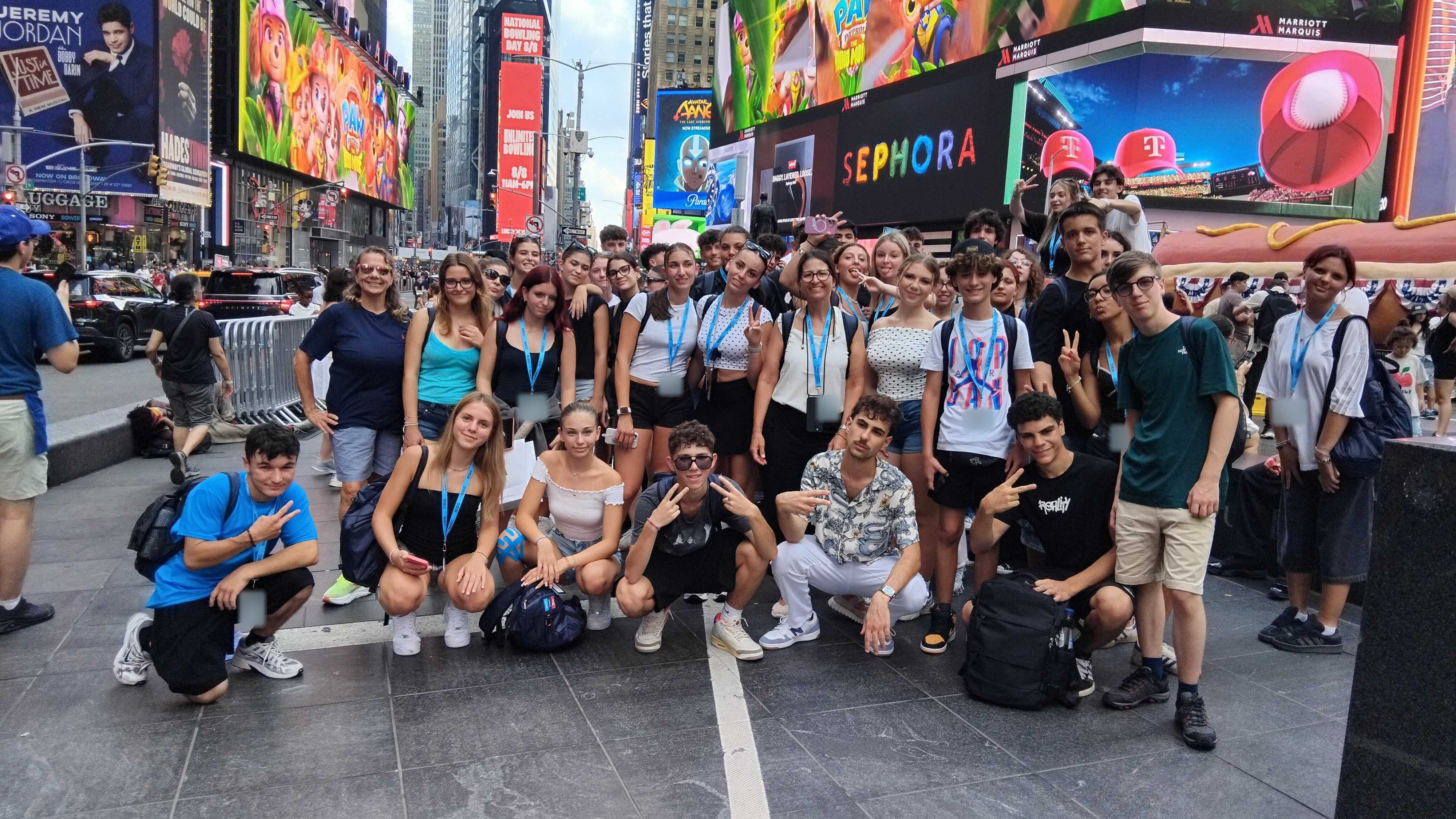 A large YES USA group in Times Square, New York