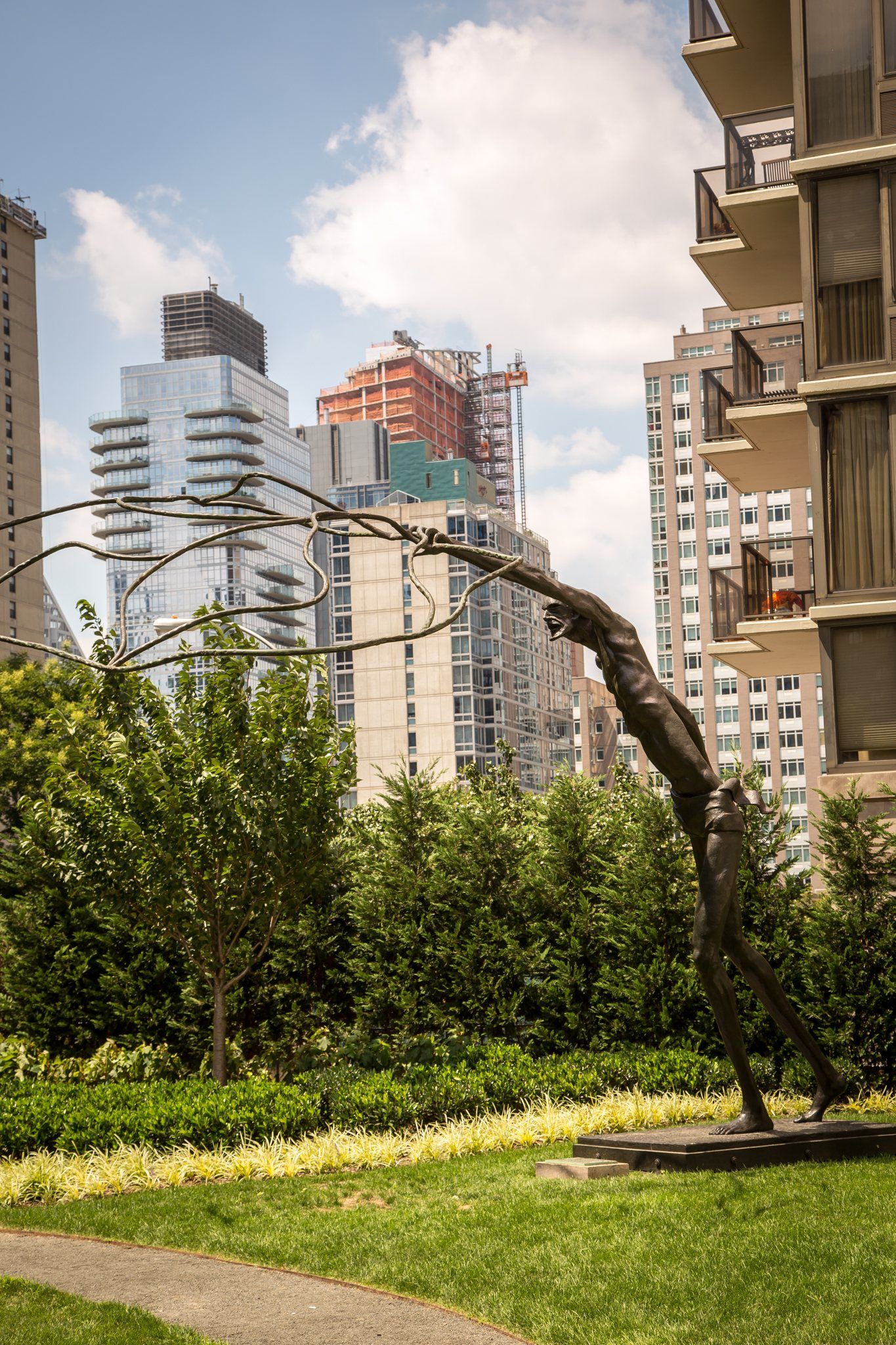 Fordham campus garden with Manhattan towers behind
