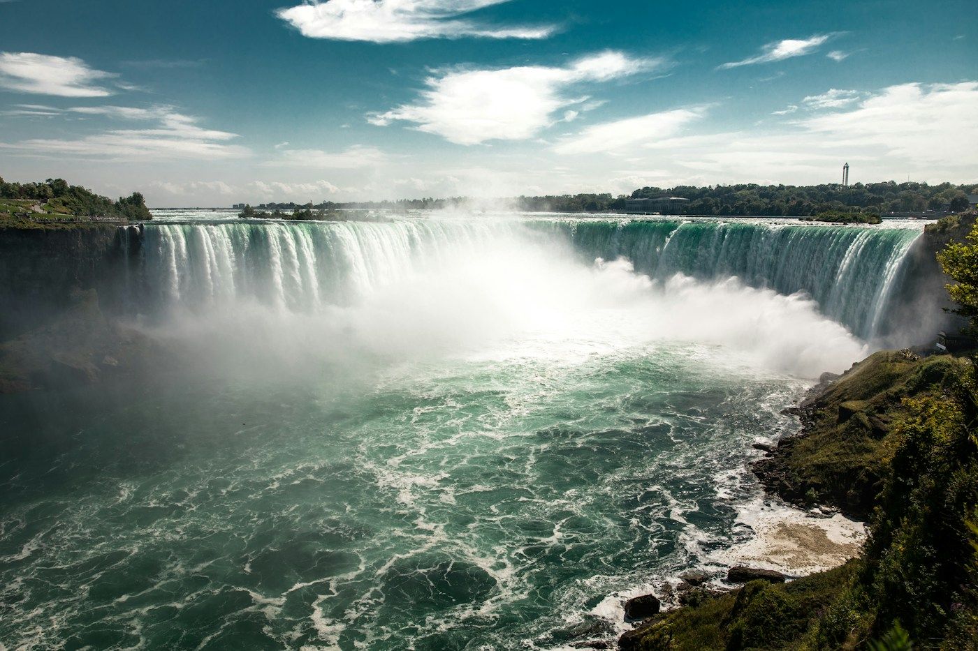 Niagara Falls under a blue sky