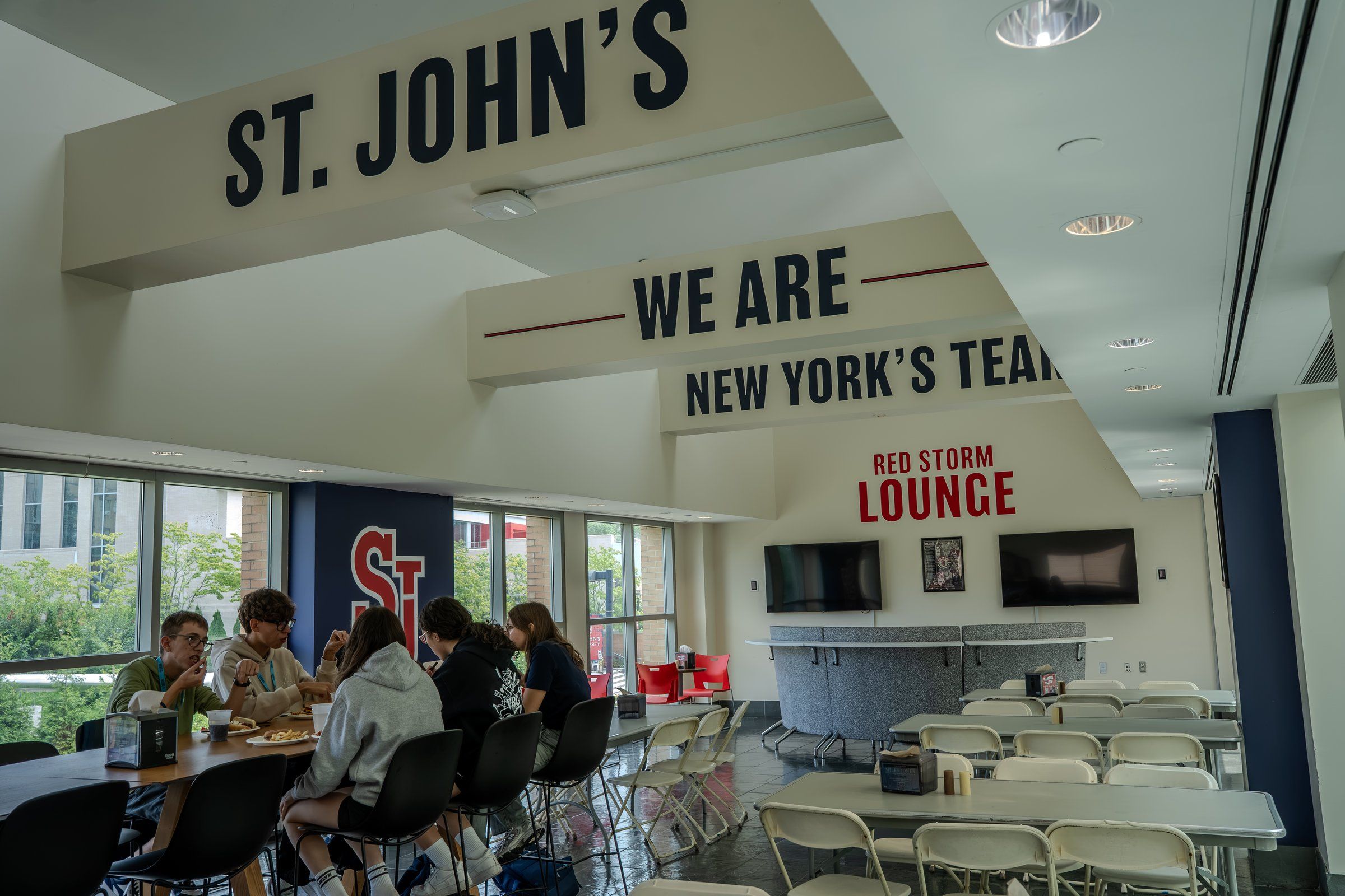 Students eating in the Red Storm Lounge at St. John's