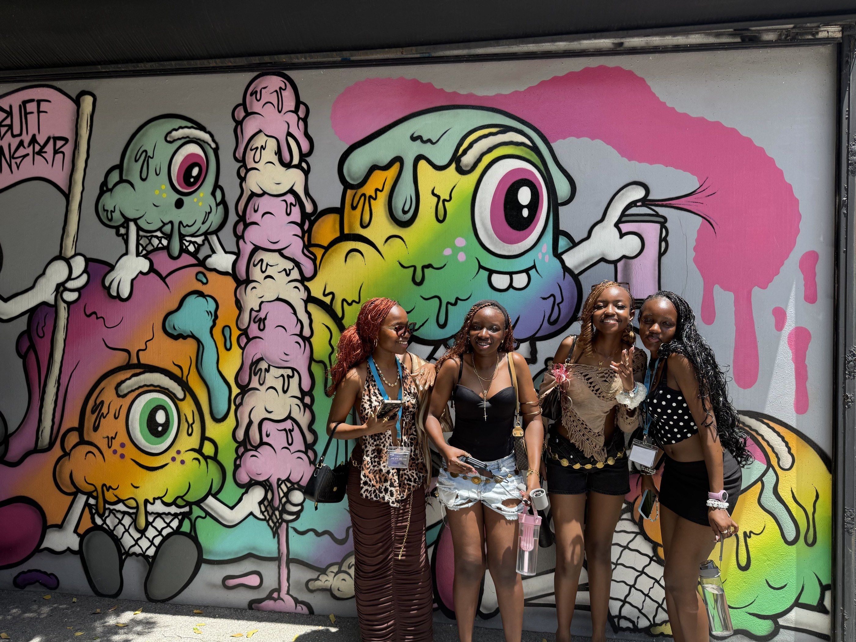 YES USA students in front of a colorful mural in Wynwood, Miami