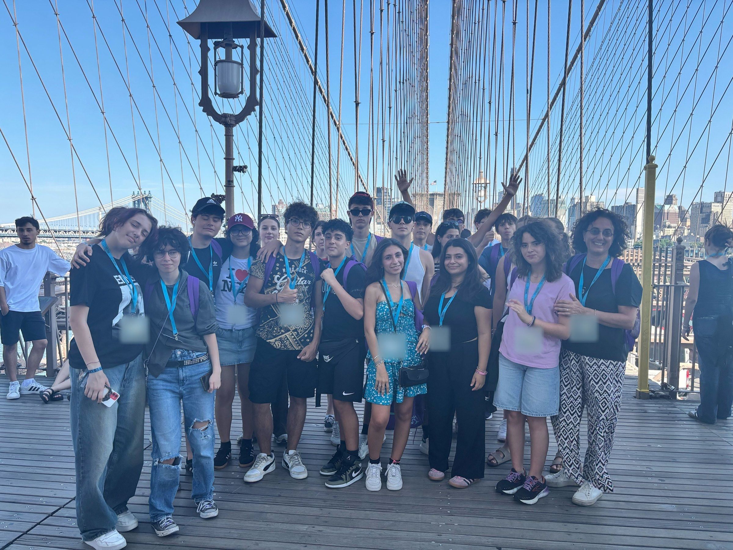 A YES USA group on the Brooklyn Bridge walkway in New York