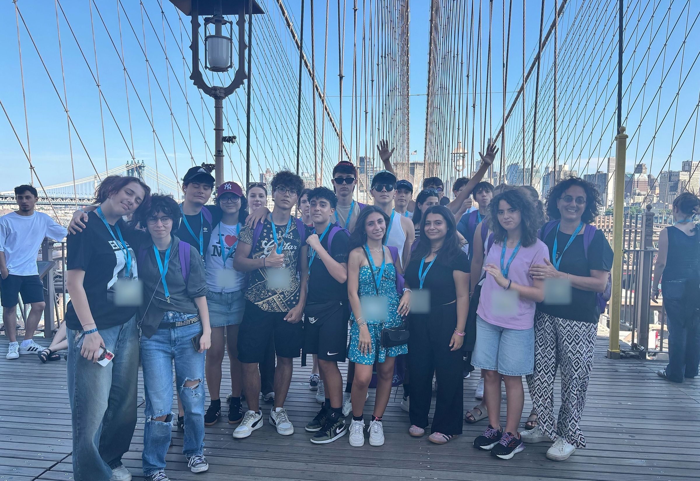 A YES USA group on the Brooklyn Bridge walkway in New York