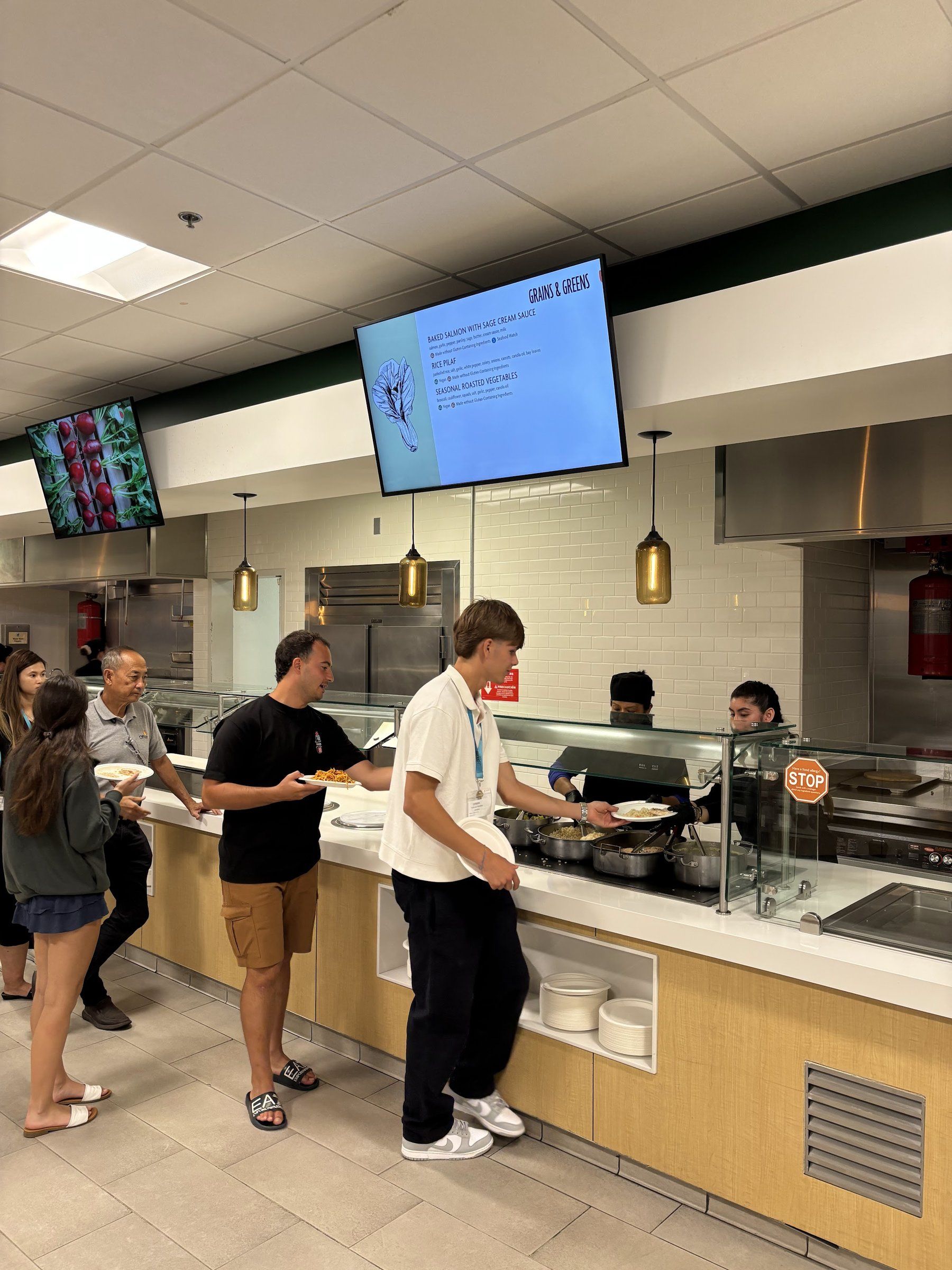 Students serving themselves at the Concordia dining-hall counter
