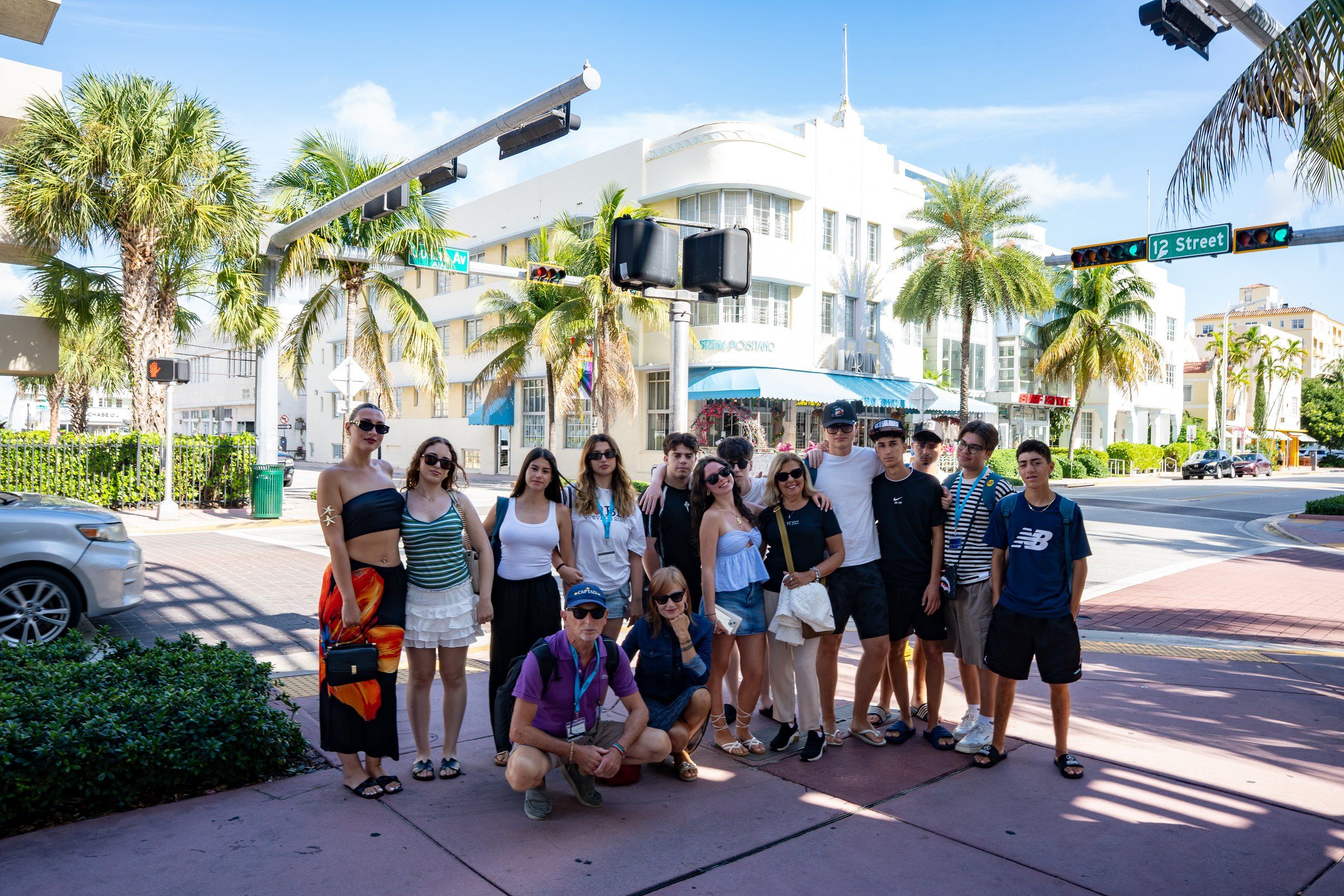 A YES USA group on an Art Deco street corner in Miami Beach
