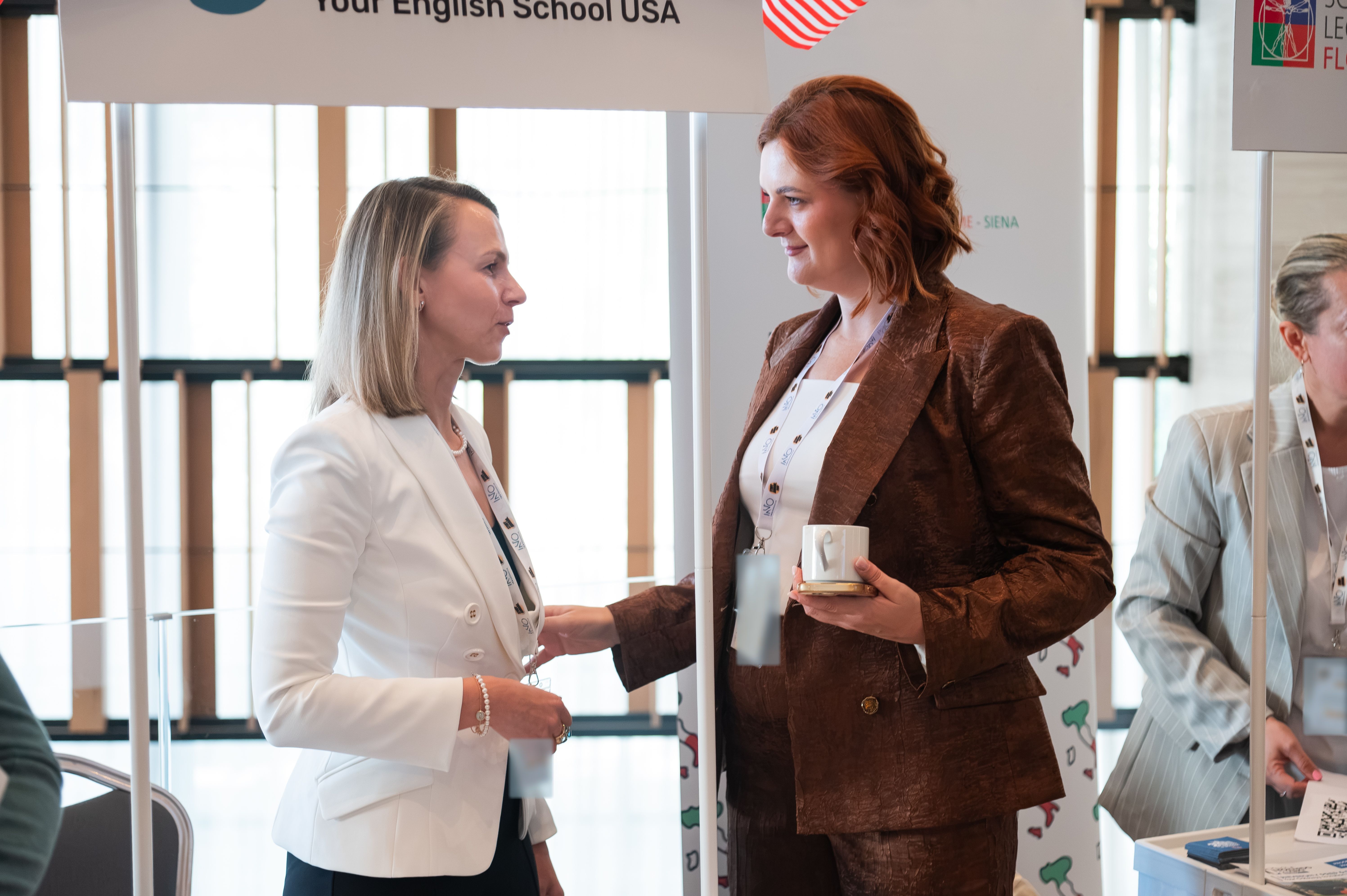 A conversation at the YES USA stand during an education fair