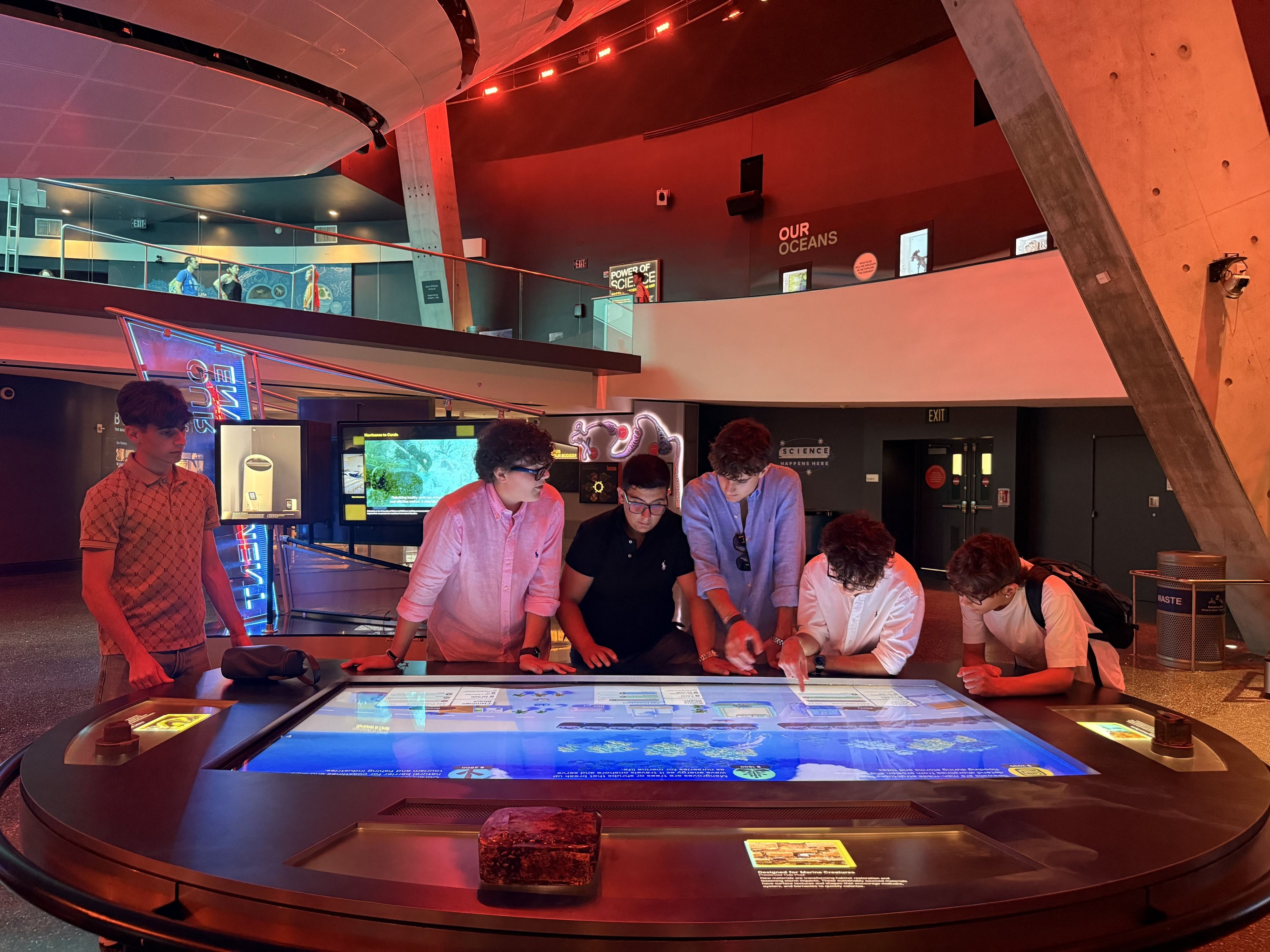 YES USA students at an interactive ocean table in the Frost Science museum, Miami