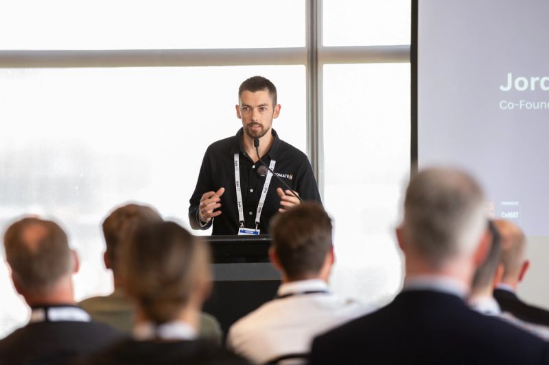 Jordan McFall of Automate-X speaking at the Logistics Automation New Zealand 2026 launch.
