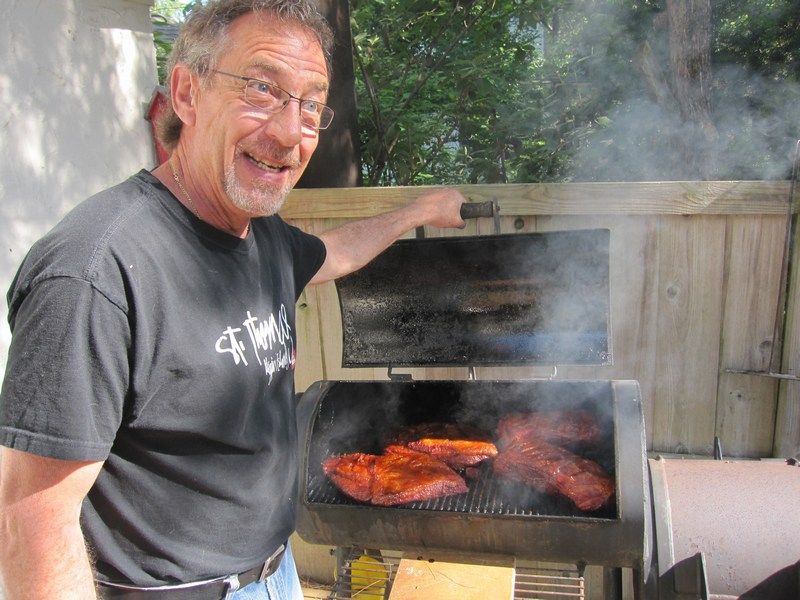 Dad doing what he does best; bbq!