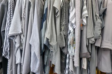 Shot of second hand clothes on a rail