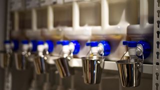 Dispensers in a row in an eco friendly shop that aims to reduce plastic packaging