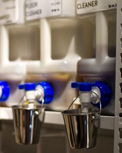 Dispensers in a row in an eco friendly shop that aims to reduce plastic packaging