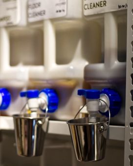 Dispensers in a row in an eco friendly shop that aims to reduce plastic packaging