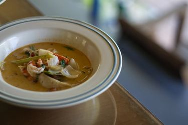A close up shot of a bowl with Asian Laksa soup