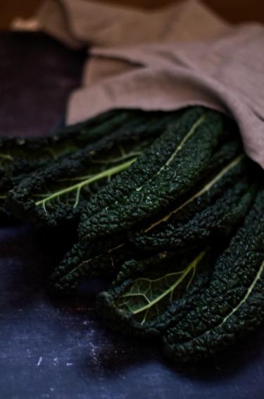Kale leaves wrapped in a linen cloth