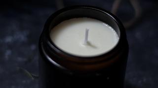 Soy wax candle in a amber candle jar