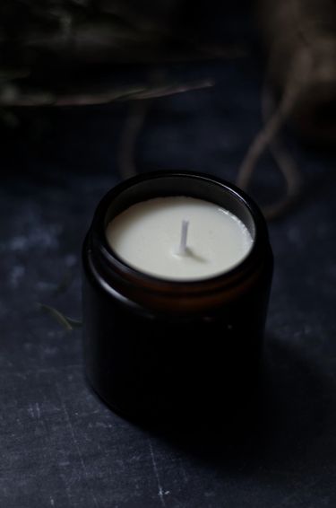 Soy wax candle in a amber candle jar