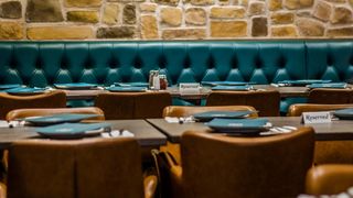 Tables and chairs at Gokyuzu Harringay, a Turkish restaurant in London