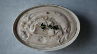 Overhead picture of homemade vegan butter on a blue background