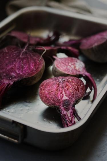 Seasoned raw beetroot slices in a dish