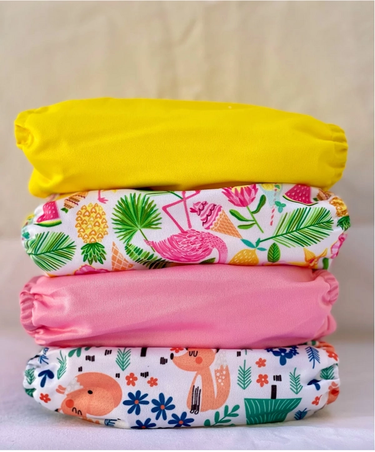 Sustainable colourful nappies stacked on top of each other.