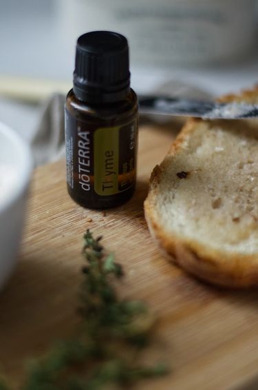 A bottle of Thyme essential Oils from brand doTERRA.