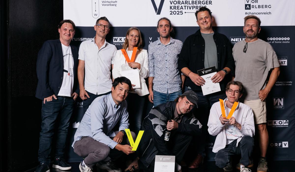 Patrick und Oliver holen den Silber-Award ab (eigentlich orange).