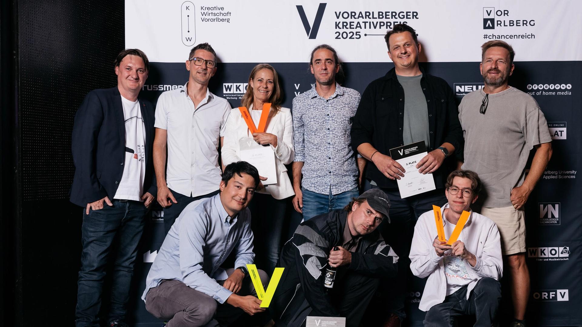 Patrick und Oliver holen den Silber-Award ab (eigentlich orange).