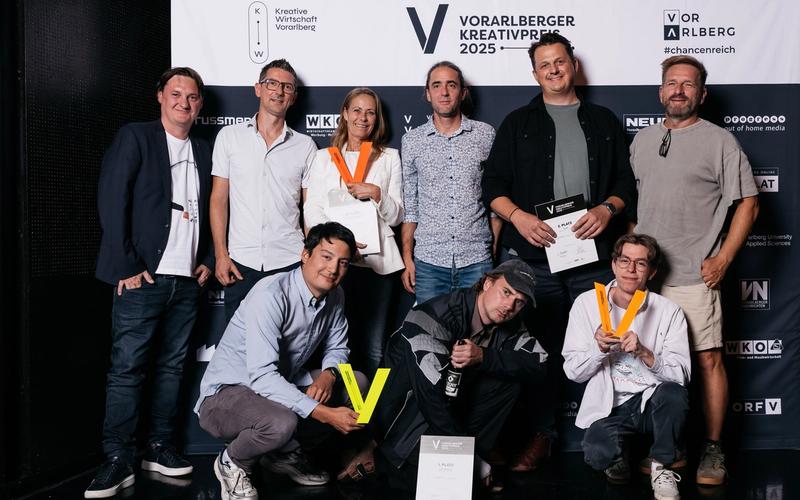 Patrick und Oliver holen den Silber-Award ab (eigentlich orange).