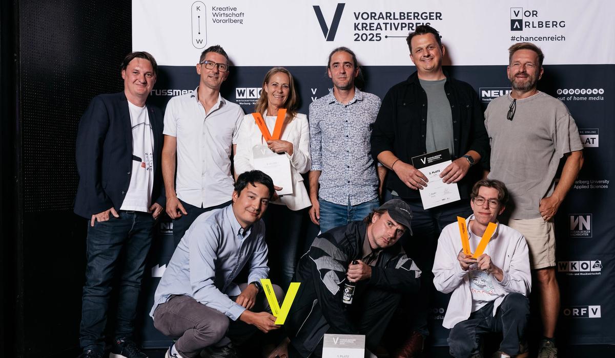 Patrick und Oliver holen den Silber-Award ab (eigentlich orange).