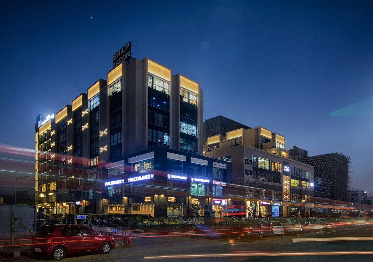 Enchanting light for the twin commercial towers Shilp Aaron: A Landmark by Atelier dada