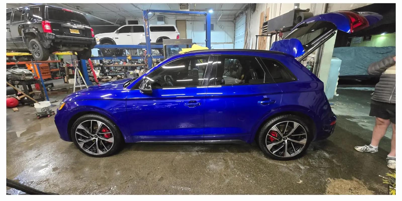 Blue Audi SQ5 with glossy finished paint after exterior detailing by Twisted Auto Detail in Anchorage
