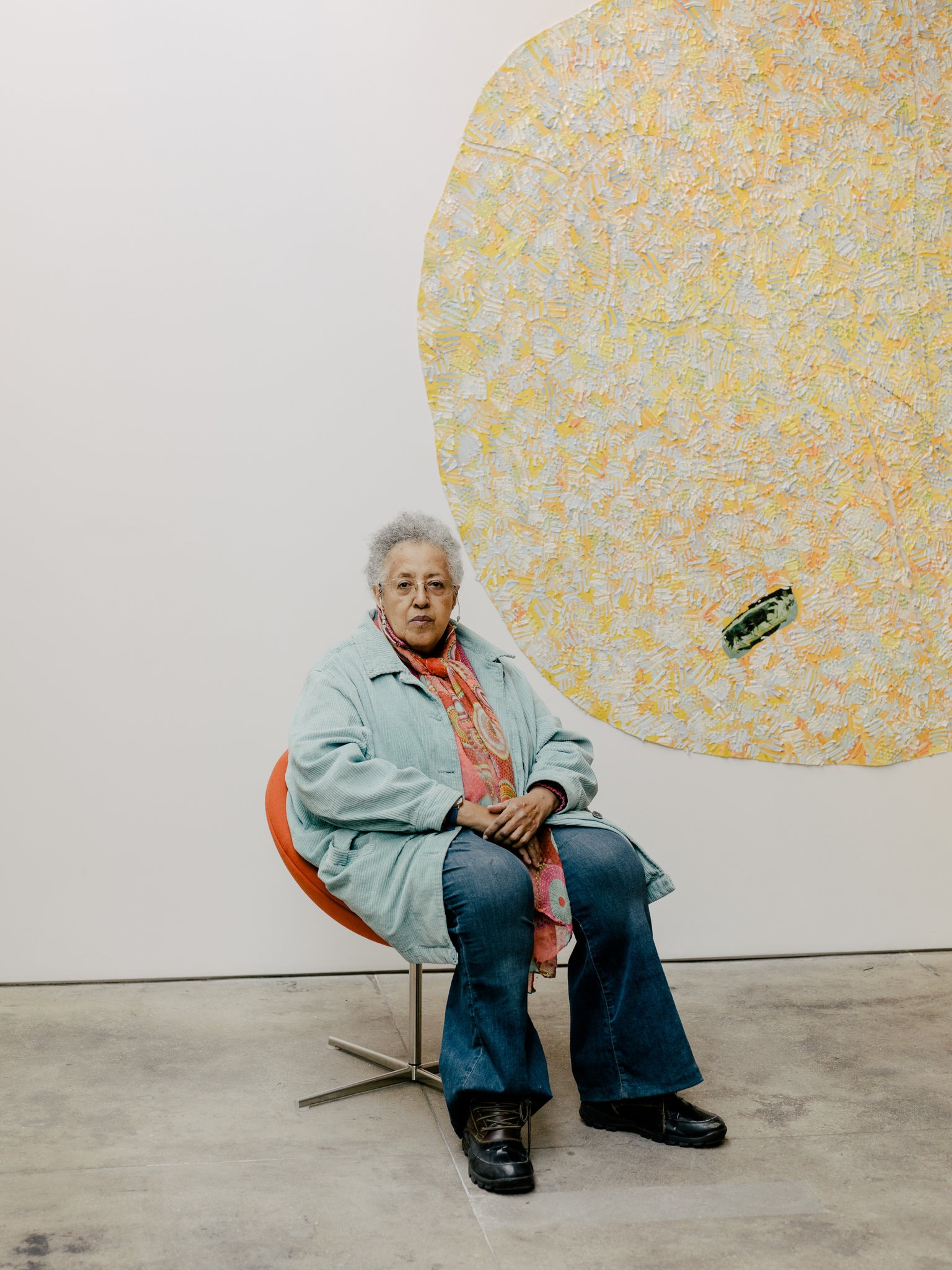 Howardena Pindell with her work “Autobiography: Artemis” (1986) at Garth Greenan Gallery in New York.