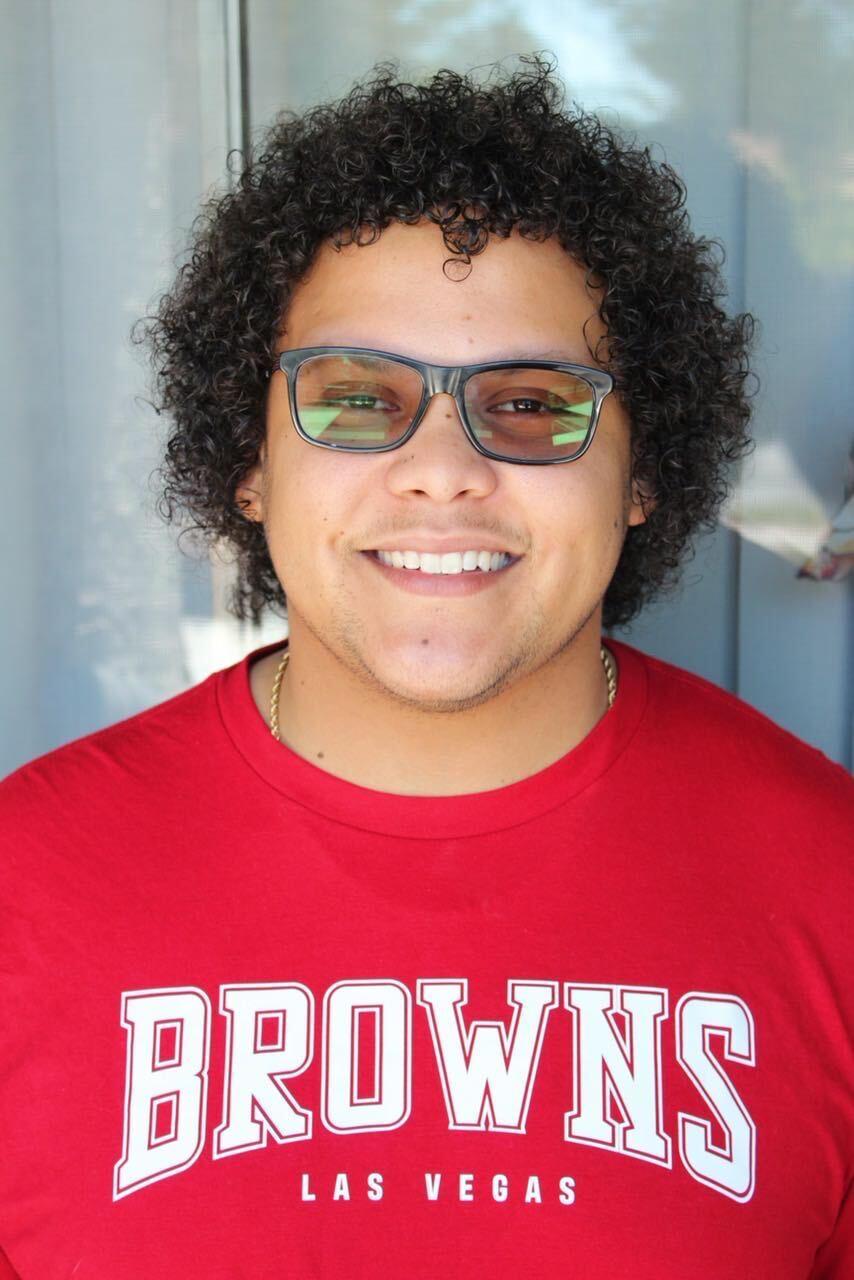 Cash Nichols wearing a red Brown’s Las Vegas shirt