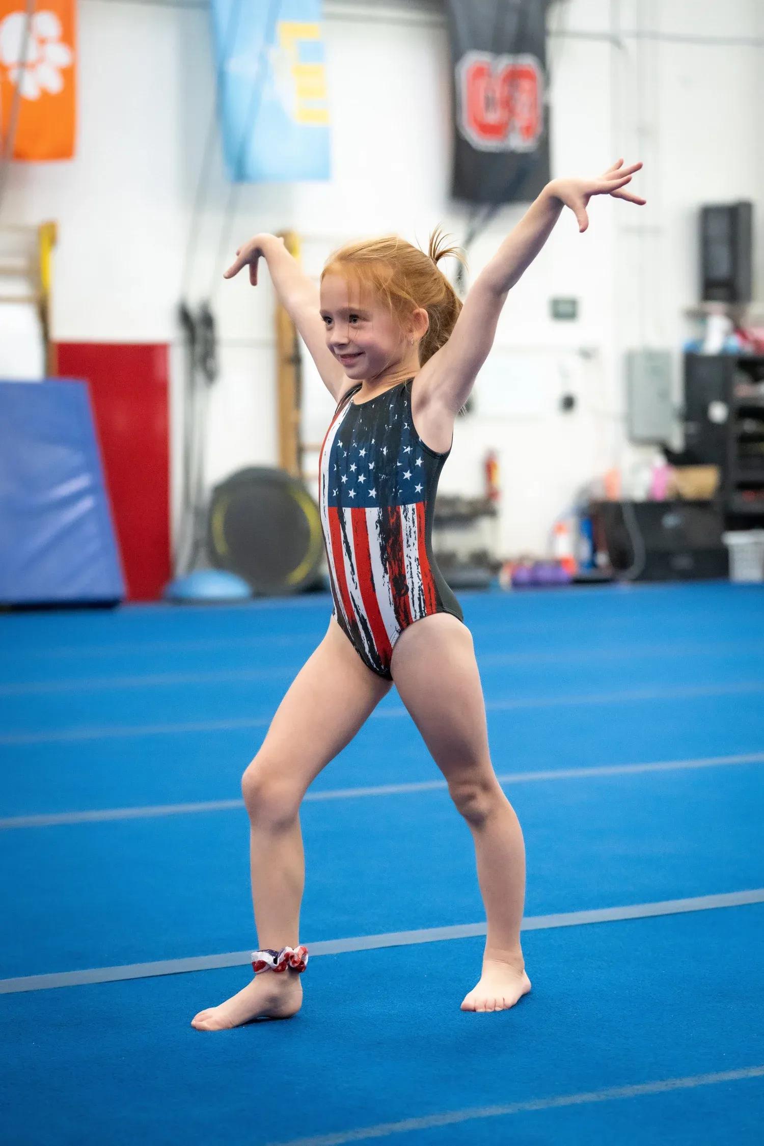 Brown's Gymnastics team athlete competing on apparatus