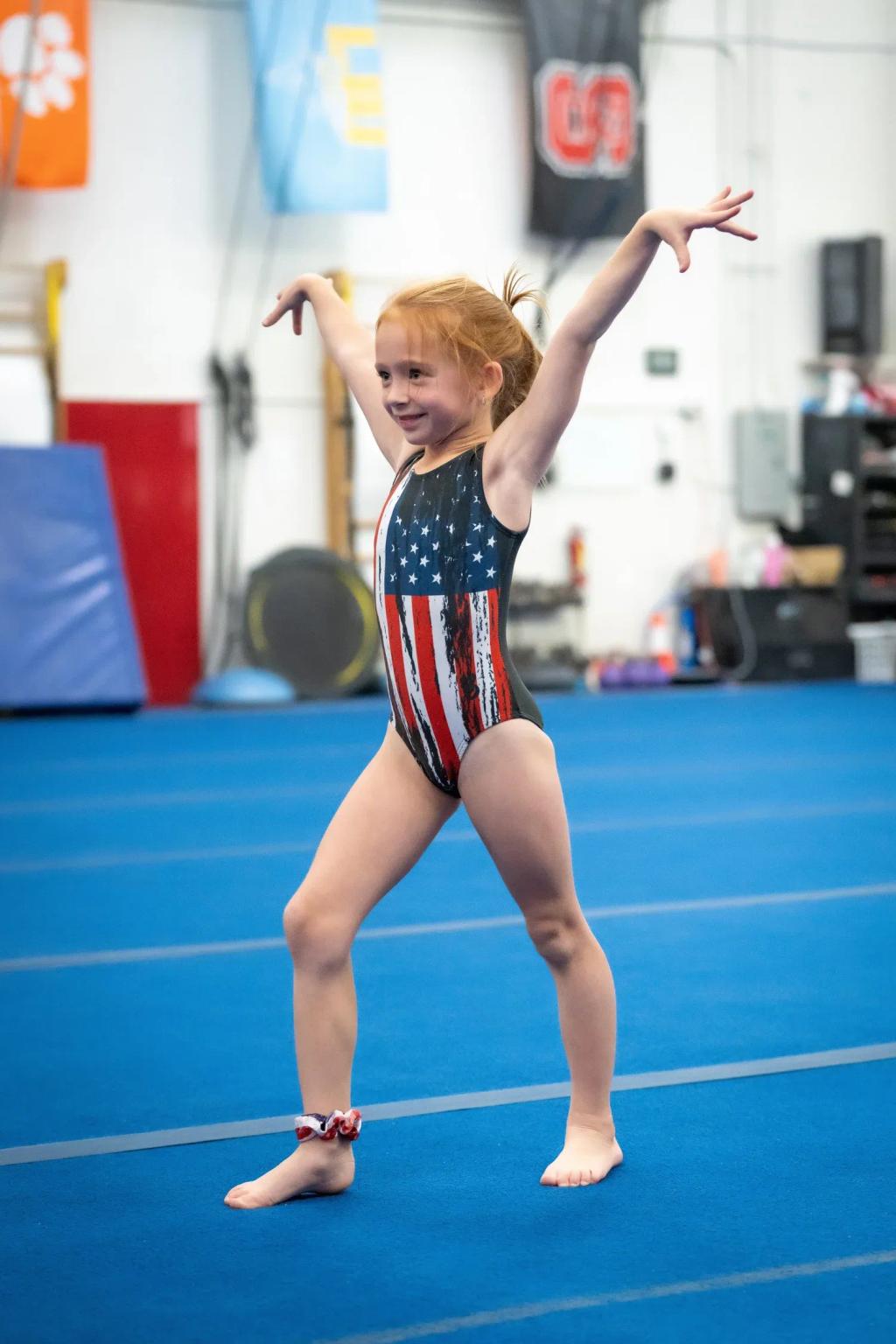 Brown's Gymnastics team athlete competing on apparatus