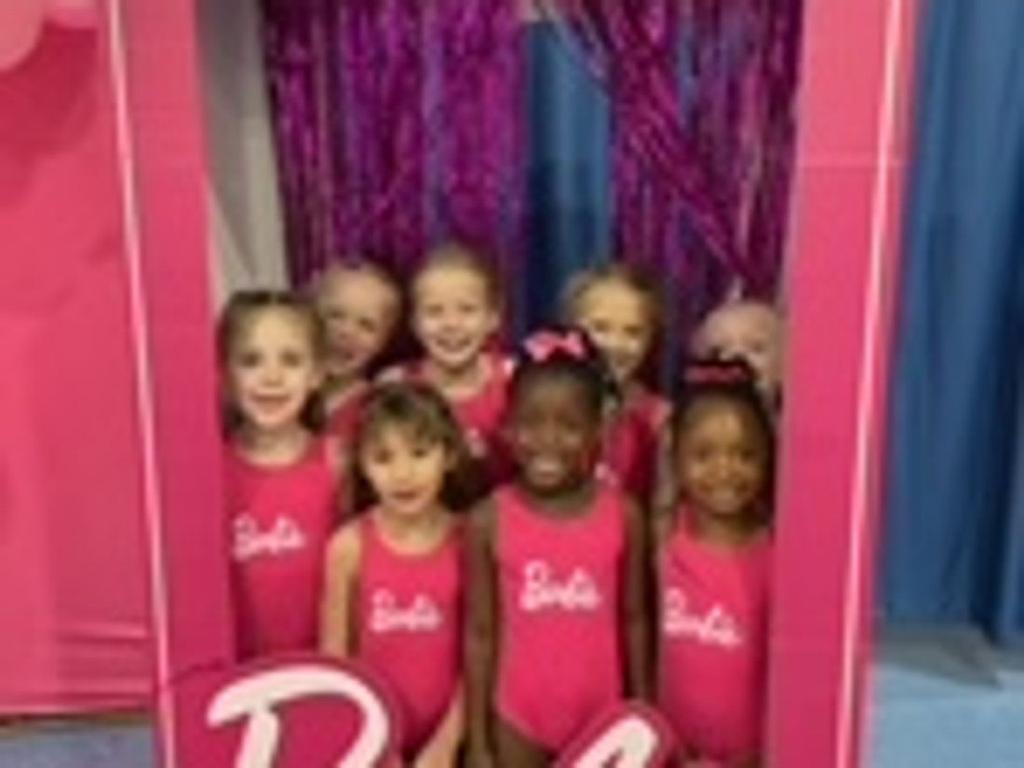Birthday group in the party photo booth at Go For It USA