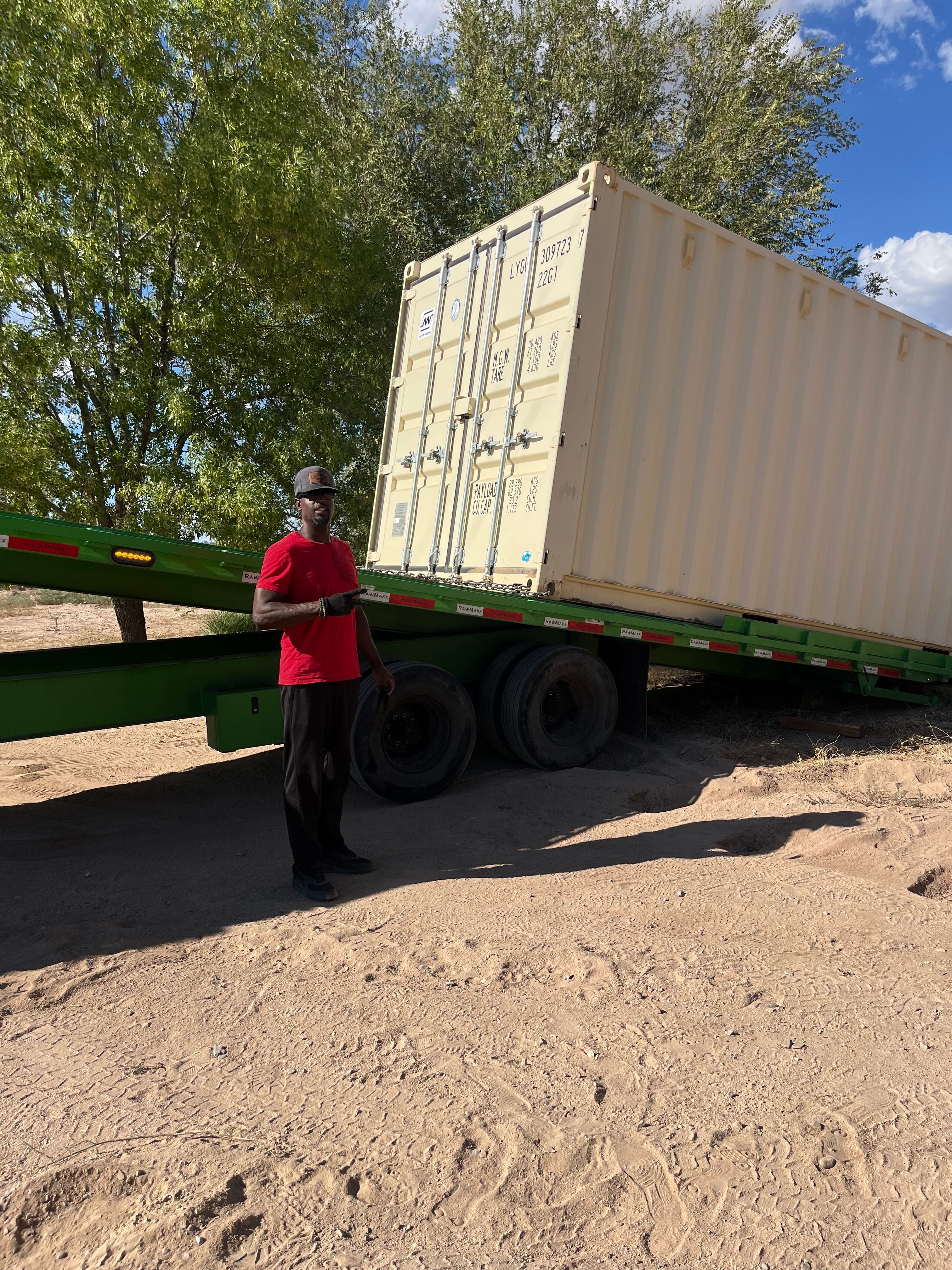 Trenady Hicks with company truck