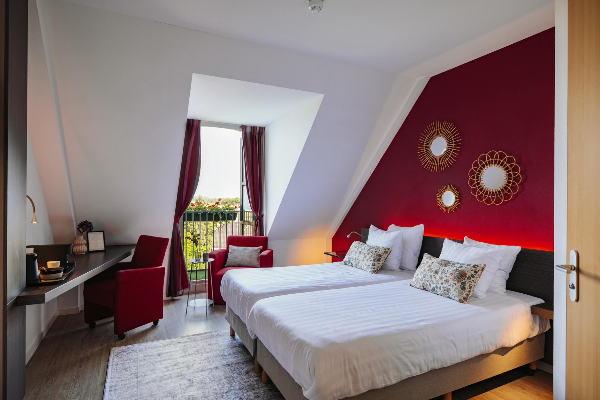 Hotelzimmer mit Blick auf die Maas im Hotel Hoogeerd