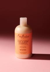 A bottle of SheaMoisture Coconut & Hibiscus Curl and Shine Shampoo