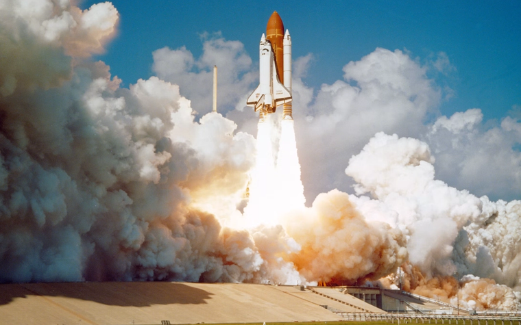 The Space Shuttle Challenger launching from Complex 39
