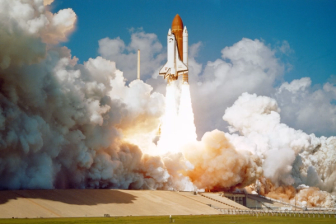 The Space Shuttle Challenger launching from Complex 39